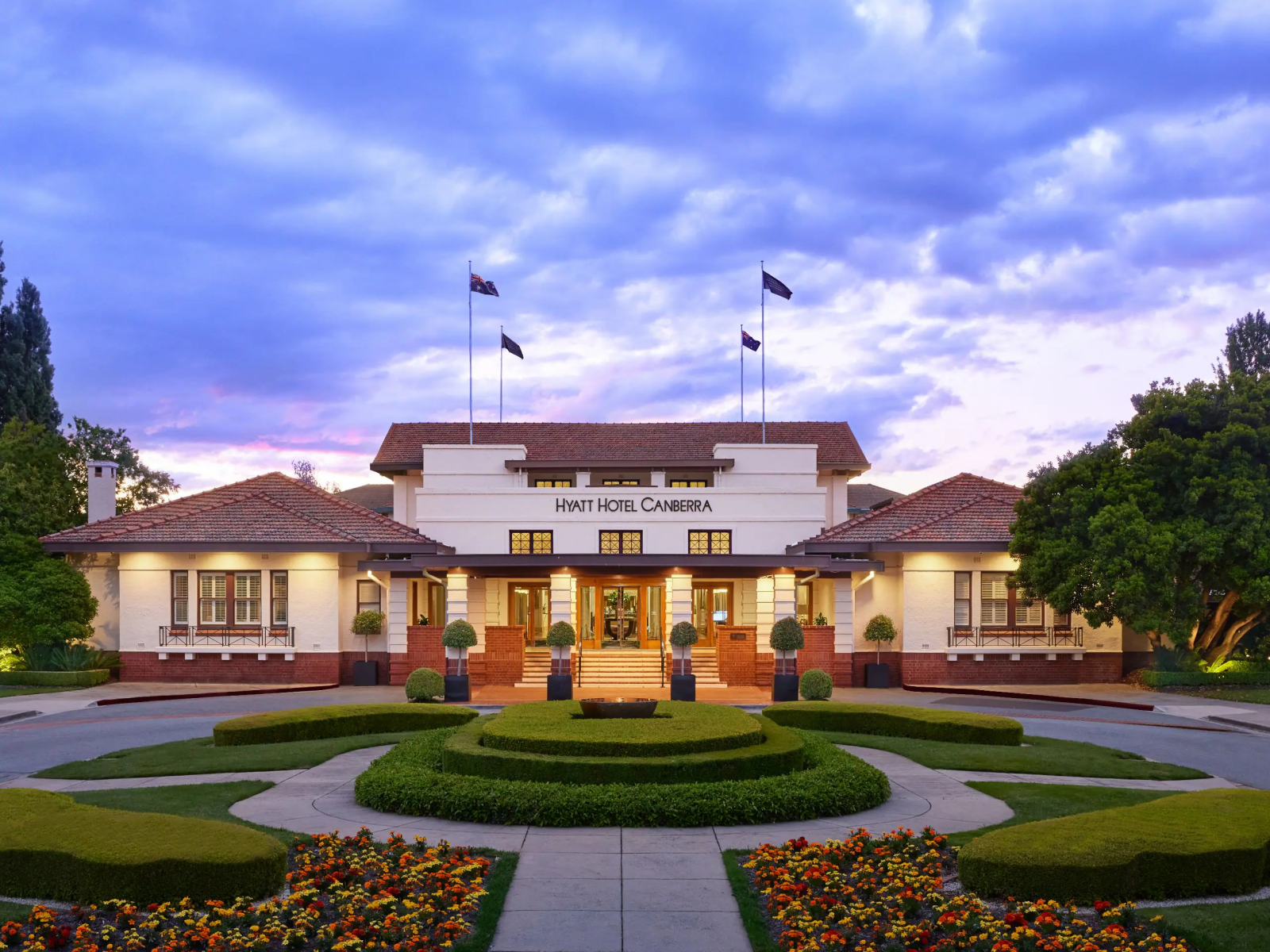 Hyatt Hotel Canberra heritage front entrance at dusk